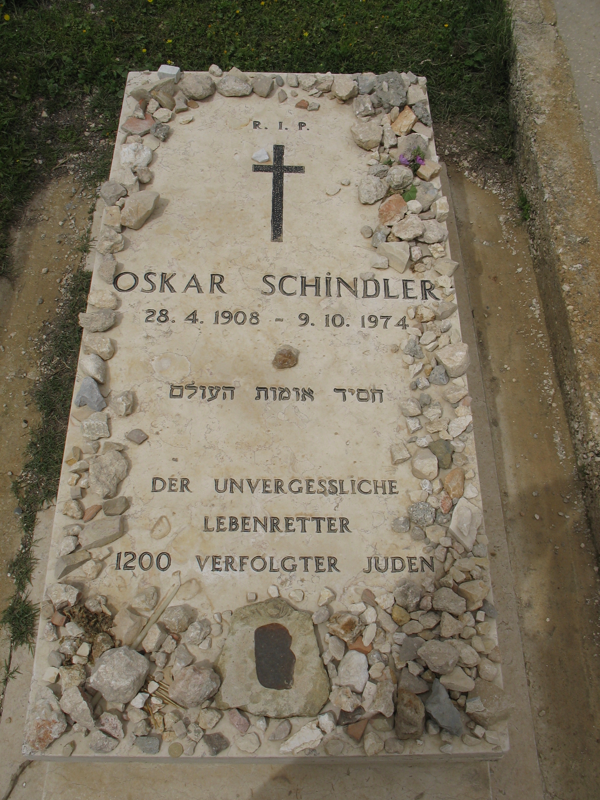 Oskar Schindler's grave at the Catholic cemetery at Mount Zion in Jerusalem, Israel, Acmthompson at en.wikipedia, Public domain, via Wikimedia Commons