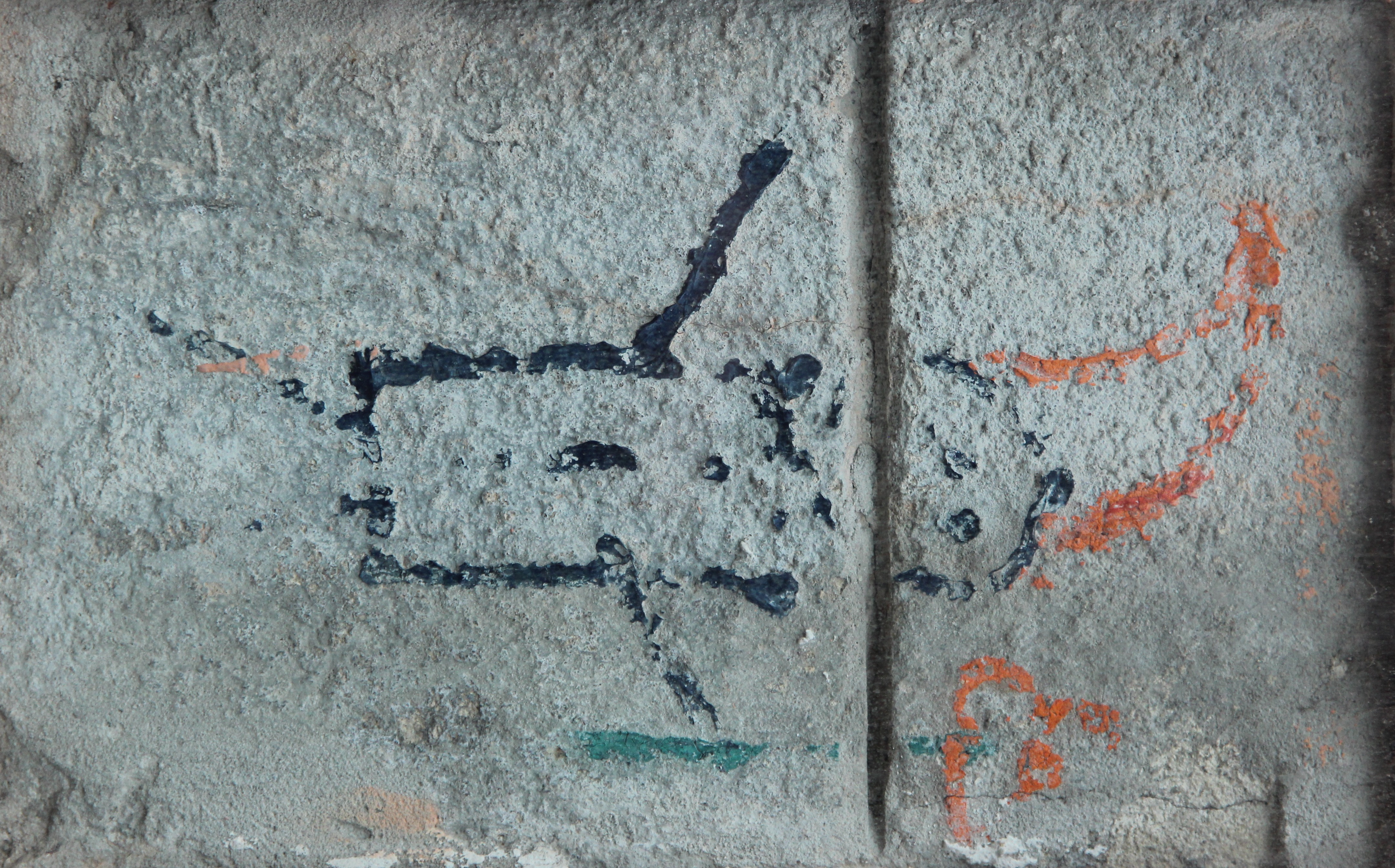 Orange Alternative Dwarf graffiti on a building wall in Wrocław, probably painted by Waldemar „Major” Frydrych; Pnapora, CC BY-SA 3.0, via Wikimedia Commons